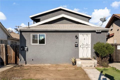 Photo of 1257 W Vernon Ave, Los Angeles, CA 90037 (MLS # SR26082071)
