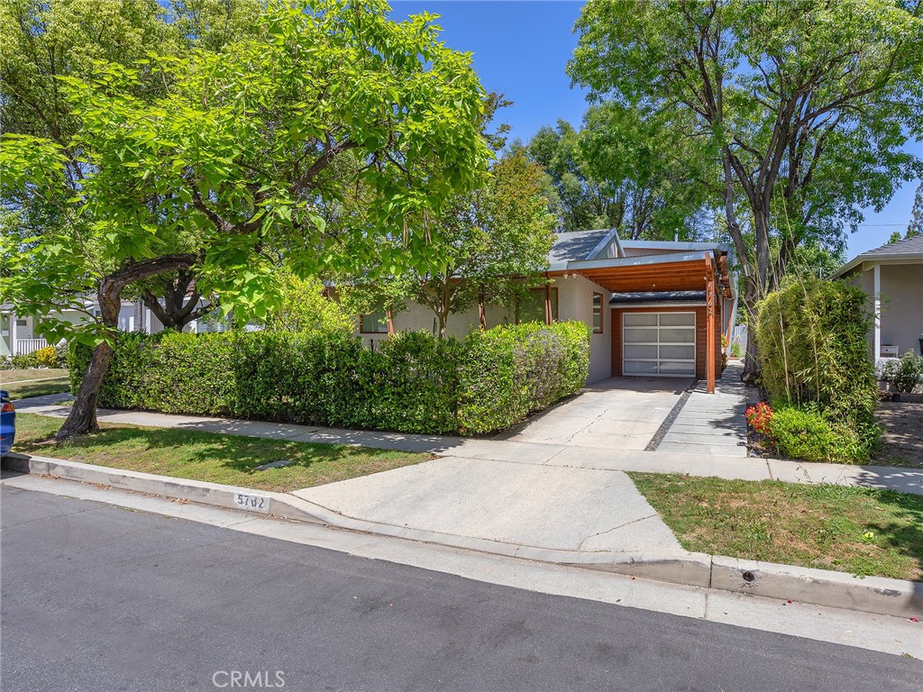 Nestled in the highly sought-after Encino Park area, this one-of-a-kind single-story contemporary showplace offers an exceptional opportunity for you. Situated on a 5,550 square foot lot, the home spans 1,833 square feet and features 3 spacious bedrooms and 3 beautifully appointed bathrooms. Reimagined by Michael Foroutan of Meta Forms Design Studios, the property is a masterpiece of sophisticated style and professional functionality. Completely rebuilt and expanded in 2005 with an open floor plan, the interior showcases rich hardwood and imported designer tile flooring, a formal dining room, a welcoming living room, and central heat and air for year-round comfort. The converted attached garage adds versatile living space, while the patio offers a serene spot to enjoy the mountain views. With too many features to list, this remarkable property offers a lifestyle unlike any other, perfect for the discerning buyer seeking both inspiration and sanctuary in the heart of Encino Park. Seller can convert two control rooms back to bedrooms.