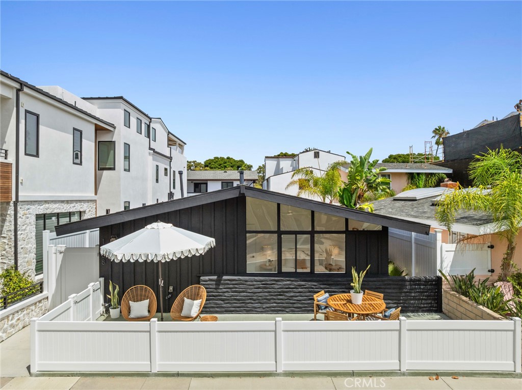 Tucked away on one of Peninsula Point’s most peaceful streets, this Mid-Century modern beach bungalow presents a rare opportunity to enjoy coastal living with style, space, and possibility. Set on an oversized, 3,252 sft lot on Miramar Drive, the home blends timeless architectural lines with thoughtful interior updates, offering an inviting retreat just moments from both the sand and the bay. Light-filled interiors highlight the clean design and effortless flow mid-century homes are known for, creating a relaxed backdrop for everyday living and entertaining. Outdoors, generous patio spaces provide a private setting for gatherings, play, or future expansion. Parking is a breeze with a two-car garage, separate workshop area, and gated pad for hassle-free golf cart parking. Beyond the property, Peninsula Point embodies the very best of Newport Beach living. Residents enjoy a unique sense of community along with access to the neighborhood bay beach, private tennis club, and proximity to the boardwalk for biking and strolling. World-famous surf at The Wedge is just around the corner, while the harbor, Balboa Village, and Peninsula dining are all within easy reach. With its prime location, oversized lot, and the enduring appeal of Mid-Century modern design, this home is move-in ready today while also offering endless opportunities to reimagine your dream coastal retreat in one of Newport Beach’s most treasured communities.