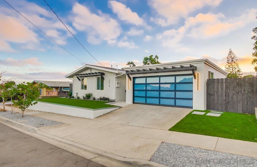DUAL primary suites in this fully renovated Bay Park designer home! This 4 bed, 3 bath home has a flexible floorplan including a 4th bedroom with French doors, perfect for an office. Enjoy seamless indoor-outdoor living with an open custom kitchen and 20 ft sliding glass doors opening to a newly landscaped yard boasting a 20ft louvered pergola, built-in BBQ and cozy fire pit. Unique amenities include a detached 2-car garage with rare pass-through capability and switchable smart glass on the front door. New roof, New A/C, New Tankless water heater, new Windows and so much more! Minutes to Sprouts, Mission Bay, USD, and Mission Valley!