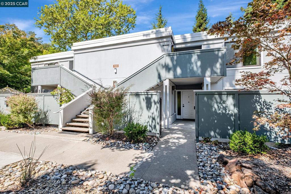 You’ll love this rare level-in Carmel model featuring both a private front patio and an enclosed back patio with a serene garden outlook—perfect for relaxing or light gardening in the sunshine. Inside, the home shines with newer kitchen cabinetry and dual-pane windows in the primary bedroom and enclosed patio for year-round comfort. The layout offers a warm and inviting feel, blending modern updates with timeless charm. The nearby carport includes convenient locked storage, and the community laundry is just steps away. Nestled in a sylvan, pet-friendly setting, this home provides a bucolic sense of privacy while remaining within easy reach of Rossmoor’s outstanding amenities. Entry 3 of Fairlawn Court is ideally situated between the Creekside Restaurant & Lounge and the Gateway Clubhouse & Farmer’s Market. Rossmoor residents enjoy 27 holes of golf, a state-of-the-art fitness center, and crafts studios, and over 200 clubs—an incredible variety of activities and amenities in this Bay Area gem for those fortunate enough to be 55 and older.