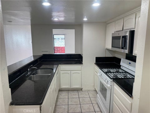 Photo of 8847 Willis Avenue #13, Panorama City, CA 91402 (MLS # SR26194657)