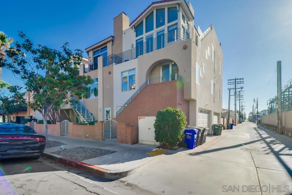 This trophy property is an incredible opportunity to acquire one of only a handful of legal vacation rental properties on Coronado—and the only one currently for sale—thanks to its unique zoning that is exempt from the city's 26-night minimum rental requirement. Experience the epitome of contemporary luxury in this fully furnished, turn-key townhouse located on the picturesque San Diego Bay side of Coronado. Soaring ceilings and hardwood floors greet you upon entry, enhancing the sense of space and elegance throughout the home. The interior boasts a stunning gourmet kitchen equipped with custom cabinetry, sleek slab countertops, and premium GE Monogram stainless steel appliances. A cozy fireplace anchors the living area, adding warmth and charm to the modern design. Ascend to your private roof deck to take in panoramic bay and bridge views—a perfect setting for entertaining or unwinding. This exceptional residence also features a two-car garage, providing convenience and ample storage. Situated in a vibrant neighborhood brimming with new restaurants, charming coffee shops, convenient grocery stores, and a wide array of services—all just steps from your front door. Meticulously designer-decorated and sold fully furnished, this home is ready for you to move in and start enjoying the Coronado lifestyle immediately. Don't miss this rare opportunity to own a true gem in one of Coronado's most desirable areas. This turn-key investment offers exceptional flexibility, whether you're looking to enjoy it as a personal retreat, maximize short-term rental income. Experience the epitome of contemporary luxury in this fully furnished, turn-key townhouse located on the picturesque San Diego Bay side of Coronado. Soaring ceilings and hardwood floors greet you upon entry, enhancing the sense of space and elegance throughout the home. The interior boasts a stunning gourmet kitchen equipped with custom cabinetry, sleek slab countertops, and premium GE Monogram stainless steel appliances. A cozy fireplace anchors the living area, adding warmth and charm to the modern design. Ascend to your private roof deck to take in panoramic bay and bridge views—a perfect setting for entertaining or unwinding. This exceptional residence also features a two-car garage, providing convenience and ample storage. Situated in a vibrant neighborhood brimming with new restaurants, charming coffee shops, convenient grocery stores, and a wide array of services—all just steps from your front door. Meticulously designer-decorated and sold fully furnished, this home is ready for you to move in and start enjoying the Coronado lifestyle immediately. Don't miss this rare opportunity to own a true gem in one of Coronado's most desirable areas.