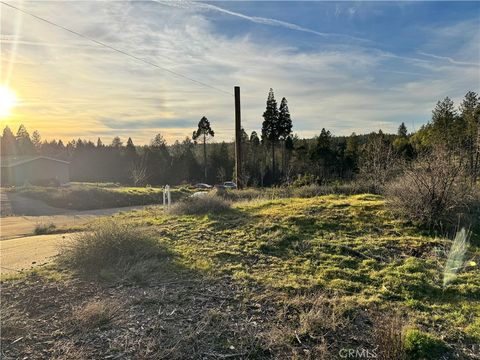 Photo of 6207 Calvary Ct Ct, Magalia, CA 95954 (MLS # SN26052391)