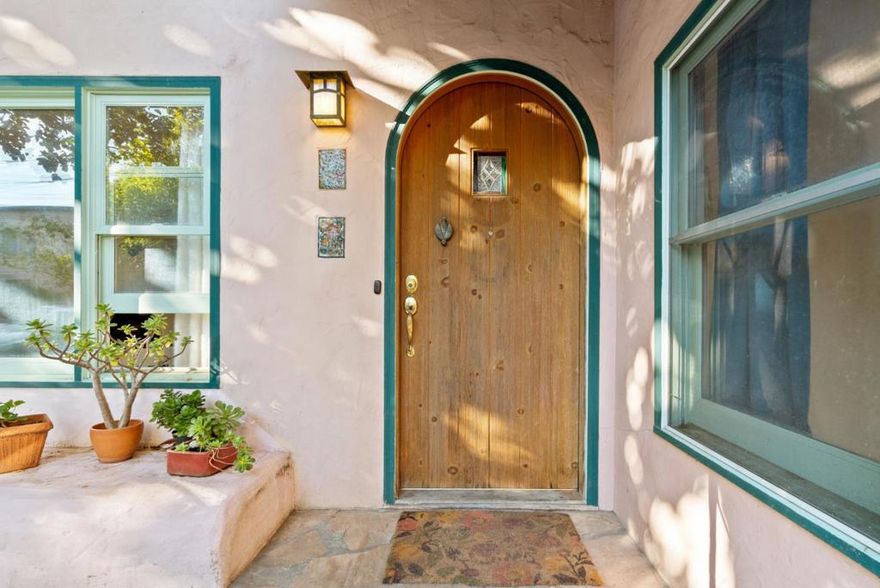 Welcome to this charming 2 bed, 1.5 bath home set in the vibrant city of Santa Cruz. We feature a functional galley kitchen with an adjacent staging area, so meal prep is a breeze. The home offers a variety of flooring options, featuring hand selected Saltillo tile & hardwood, allowing for both comfort and style throughout. A cozy Taos feel fireplace enhances the ambiance of the separate living room, perfect for relaxing evenings.  The garage conversion & added sun room offer pure natural light for the artist, while dual sets of French doors give direct access to the yard and easy care gardens created over the last 30 years.  Possibly Santa Cruz City's largest fruit bearing avocado trees is one of the jewels of the property, balanced by an equally magnificent Magnolia to provide gentle shade all year.  Additional amenities include a skylight, providing natural light & brightening the home. For your convenience, laundry facilities are available with gas hookups in the outside utility room. Though there is no garage, a shed offers extra storage space.  Enjoy the laid-back lifestyle & community vibe that Santa Cruz has to offer in this well-located & comfortable home. A short walk to restaurants, entertainment, shopping and the beach combine to make this your perfect Shangri-La!