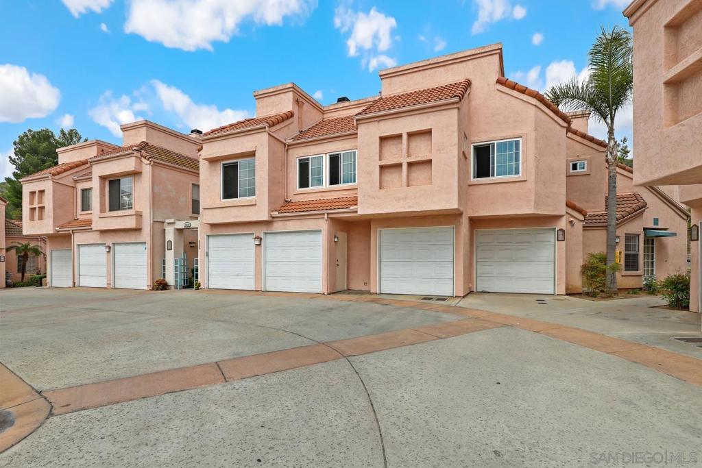 Charming Townhome in Rancho Villas! Enjoy comfort and convenience in this spacious home featuring direct access from a 1-car garage with a Tesla charger, an open floor plan, and soaring vaulted ceilings. The large living room offers a cozy fireplace, while the updated kitchen boasts stainless steel appliances, crisp white cabinetry, recessed lighting, and Pergo flooring throughout. Additional highlights include indoor laundry, a skylight that fills the hallway with natural light, central heat and A/C, and a generous primary bedroom with vaulted ceilings and a walk-in closet. Located in the sought-after Rancho Villas community with access to pools, spas, tennis courts, and close to shopping, dining, parks, and more! FHA and VA approved complex.