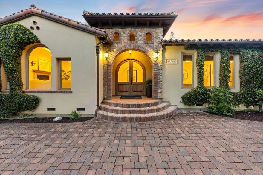 Beautiful European inspired custom home in Monte Sereno! Exquisitely designed by current owners & built 18 years ago, Beautiful front facade echos timeless design w/ pigmented stucco & used brick accents over arched windows generous front entry.  Thoughtful floorplan is perfect for today's living.  Sunlit interior spaces w/ volume ceilings showcase spacious open living spaces. 4 bedrooms are en-suite.  3 bedrooms including primary suite & large office (or bed) on main level as well as laundry. Well-appointed open concept kitchen has great working triangle w/ professional grade appliances & ample work spaces to accommodate multiple chefs. A large family room w/ built-in cabinetry has wall of windows & opens to rear loggia & backyard. The extra wide staircase gracefully connects lower level enjoys bonus room w/ wet bar, en-suite bedroom, exercise room (or 6th bedroom) & temp controlled wine room. A backyard paradise of variegated & flowering shrubbery surrounds a sparkling pool & spa! Enjoy dining al fresco w/ friends & family or playing on the lush lawn area. Steps from Daves Ave School, a quick stroll to downtown LG vibrant shops and dining or easy access to Hwy 85. This popular location meets all needs!