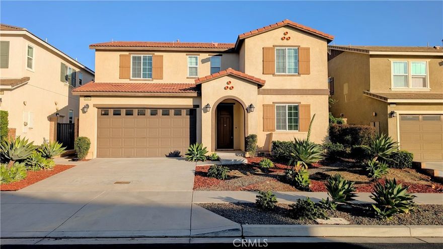 Constructed in 2017, this residence is located within the Stonehaven neighborhood developed by CalAtlantic Homes and offers a flexible layout designed for modern living. The home features four well-sized bedrooms, including a bedroom on the first floor that accommodates a variety of lifestyle needs.

The interior is filled with natural light and enhanced by newly installed elegant luxury vinyl flooring throughout, adding both style and durability. The open living and dining areas flow effortlessly, creating an inviting setting for everyday living and entertaining. The kitchen is both functional and refined, showcasing granite countertops, stainless steel appliances, and ample pantry storage.

Upstairs, the spacious primary suite serves as a comfortable retreat with a well-appointed bathroom featuring dual sinks and a generous walk-in closet. Two additional bedrooms are thoughtfully positioned nearby, along with a full secondary bathroom and a conveniently located laundry room, offering privacy and practicality.

The property is located within the Etiwanda School District, with nearby schools serving the community (buyers to independently verify school assignments and availability) and is ideally situated near Falcon Ridge Town Center, the property provides close proximity to shopping, dining, and daily conveniences, as well as access to nearby amenities and commuter routes.