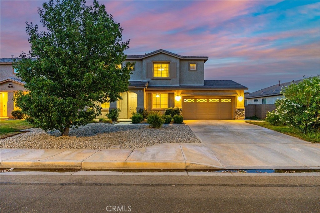 ***LIVE BEAUTIFULLY*** Welcome to this 4-bedroom, 3-bathroom home nestled in the desirable West Lancaster community. Built in 2005, this well-maintained residence offers the perfect blend of space, comfort, and function—ideal for growing families or those who love to entertain. Step inside to find a thoughtful floor plan featuring a downstairs bedroom with a full bathroom, perfect for guests or multi-generational living. The home boasts an adjoining formal living and formal dining room, providing elegant spaces for special gatherings. Upstairs, a versatile loft offers additional living space—great for a home office, game room, or media area. The massive primary suite is a true retreat, complete with its own cozy fireplace, dual walk-in closets, and a spacious en-suite bathroom. The spacious kitchen features ample cabinetry, a center island, double ovens, and an open flow to the family room with a warm fireplace—perfect for everyday living and entertaining. With three full bathrooms, generous living areas, and modern conveniences throughout, this home offers everything you need and more. Located in a quiet, established neighborhood in West Lancaster, this property is close to schools, parks, and shopping.