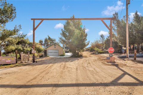 Photo of 13633 Summit Valley Road, Hesperia, CA 92345 (MLS # HD25088025)