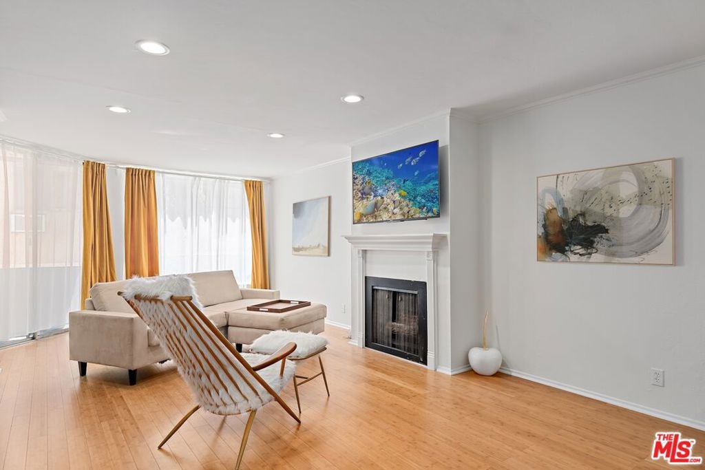 Photo of 1745 Camino Palmero Street #106, Los Angeles, CA 90046 (MLS # 25627495)