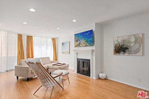 Photo of 1745 Camino Palmero Street #106, Los Angeles, CA 90046 (MLS # 25627495)