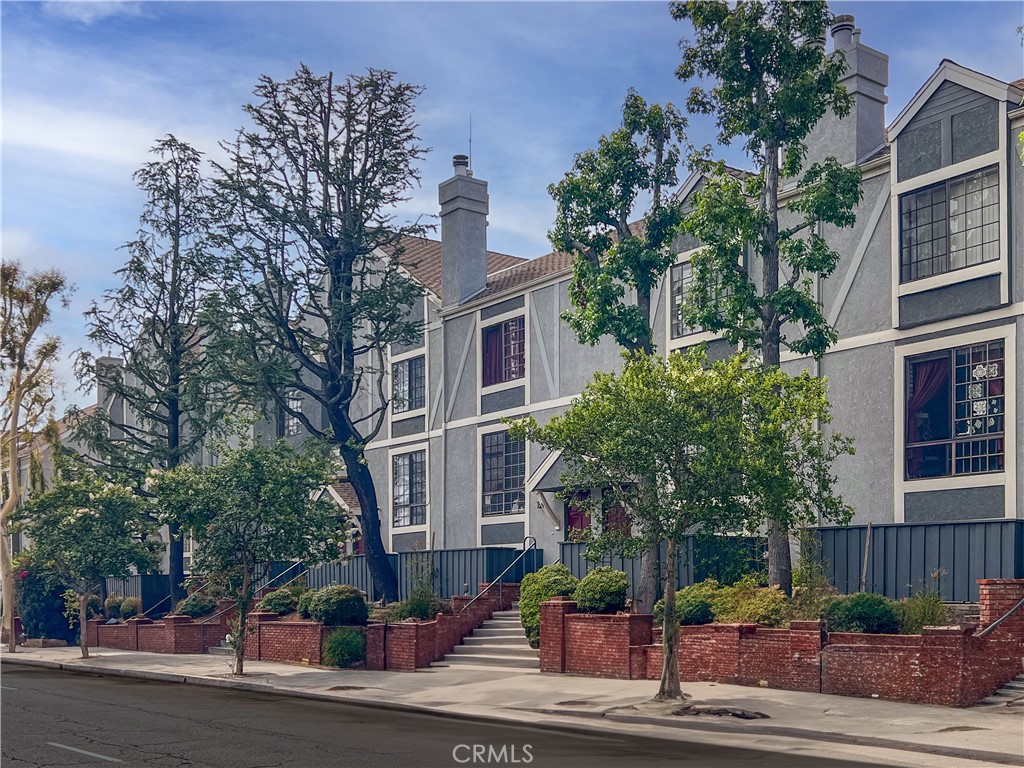 Welcome home to this spacious and recently updated unit located in desirable Lindley Townhomes! Boasting approximately 2112 sq. ft., 3 bedrooms, 4 baths, and an attached 2-car garage, this unit has all the space that you need! In the entry level, you will find a spacious, light-filled family room with a fireplace, a formal dining area, and a wet bar. The recently updated light and bright kitchen is ready for entertaining and has plenty of space with a breakfast area and a second dining table. Upstairs, you'll fall in love with the cozy primary bedroom with a fireplace, 3 closets, and a large bathroom with his and hers sinks. There is also a second bedroom with an en suite bathroom, great for privacy and convenience. Downstairs, there is the third bedroom with an en suite bathroom and the laundry room leading out to the attached 2-car garage. Just outside the front door, there is a small patio perfect for al fresco dining. The community has an inviting pool area with ponds, picnic areas, and a sparkling pool for those hot summer days. This light-filled stunner is the one you've been looking for, and that is priced to sell!