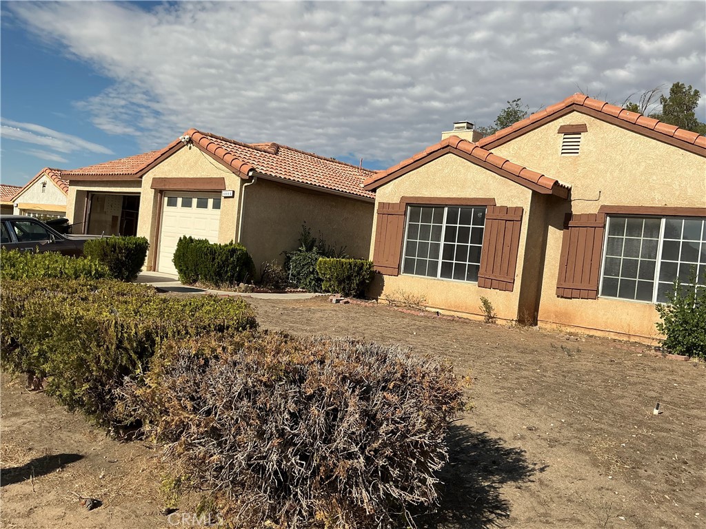 MAKE IT YOUR OWN!!!! This 4 bedroom 2 bathroom gem located close to schools, shopping and everything else is ready for your family. This home features oversize rooms, formal living room with two sided fireplace,3 car garage, covered patio, 2 storage sheds, oversize back yard and much much more.