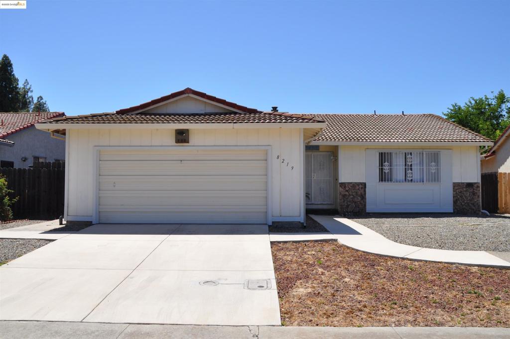 Enjoy living in this 2-bedroom, 2-bath, single level, 1318-sqft home in a quiet 55+ community. Located close to businesses, shops, restaurants, parks, and even medical facilities, this home has a large, natural-lit living room with a wood burning fireplace for those cold winter nights, and a deck in the back yard to soak up the sun rays during the summer. Additionally, you can take advantage of the community recreational area and have a BBQ with friends and family, then relax in the hot tub or cool off in the pool during the hot summer days. Besides the living room, the house features 2 spacious bedrooms, each one with its own sizable closet and bathroom, a modern kitchen with a dining area and plenty of cabinet space. All appliances are included at no cost to the buyer. An additional room that leads to the covered back deck area can be used as an office, to do yoga or as an arts and crafts room to enjoy quality time with the grandkids. The low maintenance front yard will not be a challenge, and the enormous backyard can hold multiple fruit trees, or it can be landscaped to meet your vision. There is a working table and plenty of storage room in the 2-car garage. Only a few miles from the marina this is the perfect retirement home.