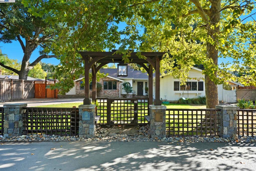 Prime court location walking distance to downtown Danville + Iron Horse Trail! Updated 4BR home on approx. 1/3-acre, park-like lot with pool. Hardwood floors throughout, bright social spaces, and recently renovated bathrooms. Large family room with gorgeous wood beams! Incredible outdoor pavilion features: outdoor shower, dedicated dog wash, half bath with sink, wine fridge, 2-head kegerator, and full surround-sound system—ideal for entertaining. Expansive yard offers multiple seating/dining zones and room to play. Sought-after neighborhood vibe with cul-de-sac privacy and close proximity to shops, dining, parks, and commuter routes. Award winning schools. A rare Danville lifestyle opportunity!