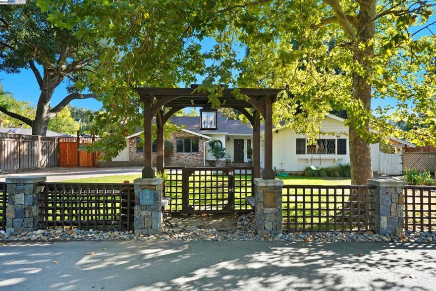 Prime court location walking distance to downtown Danville + Iron Horse Trail! Updated 4BR home on approx. 1/3-acre, park-like lot with pool. Hardwood floors throughout, bright social spaces, and recently renovated bathrooms. Large family room with gorgeous wood beams! Incredible outdoor pavilion features: outdoor shower, dedicated dog wash, half bath with sink, wine fridge, 2-head kegerator, and full surround-sound system—ideal for entertaining. Expansive yard offers multiple seating/dining zones and room to play. Sought-after neighborhood vibe with cul-de-sac privacy and close proximity to shops, dining, parks, and commuter routes. Award winning schools. A rare Danville lifestyle opportunity!