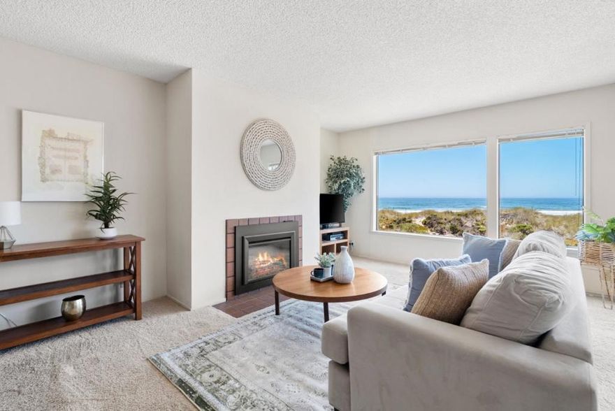 Are you searching for an Oceanview condo with no stairs? This two bedroom, two bath unit on the second floor offers exactly that, and so much more. As soon as you enter you are drawn straight to the ocean view, with endless sights of sea and birds. This unit comes complete with a newly updated electric fireplace, stackable washer and dryer, a primary bedroom with ensuite bath, and sliding doors that lead out onto a private deck overlooking the water. Enjoy walks along arguably the quietest and most pristine beach of Santa Cruz County. Pajaro Dunes is ideal for a second home or short term rental as there are no vacation rental permits required. A truly unique and rare opportunity for coastal living. Whether you're looking for an investment property, or personal getaway, unit #227 has everything you need. Don't wait as your chance to own a slice of California Coast awaits!