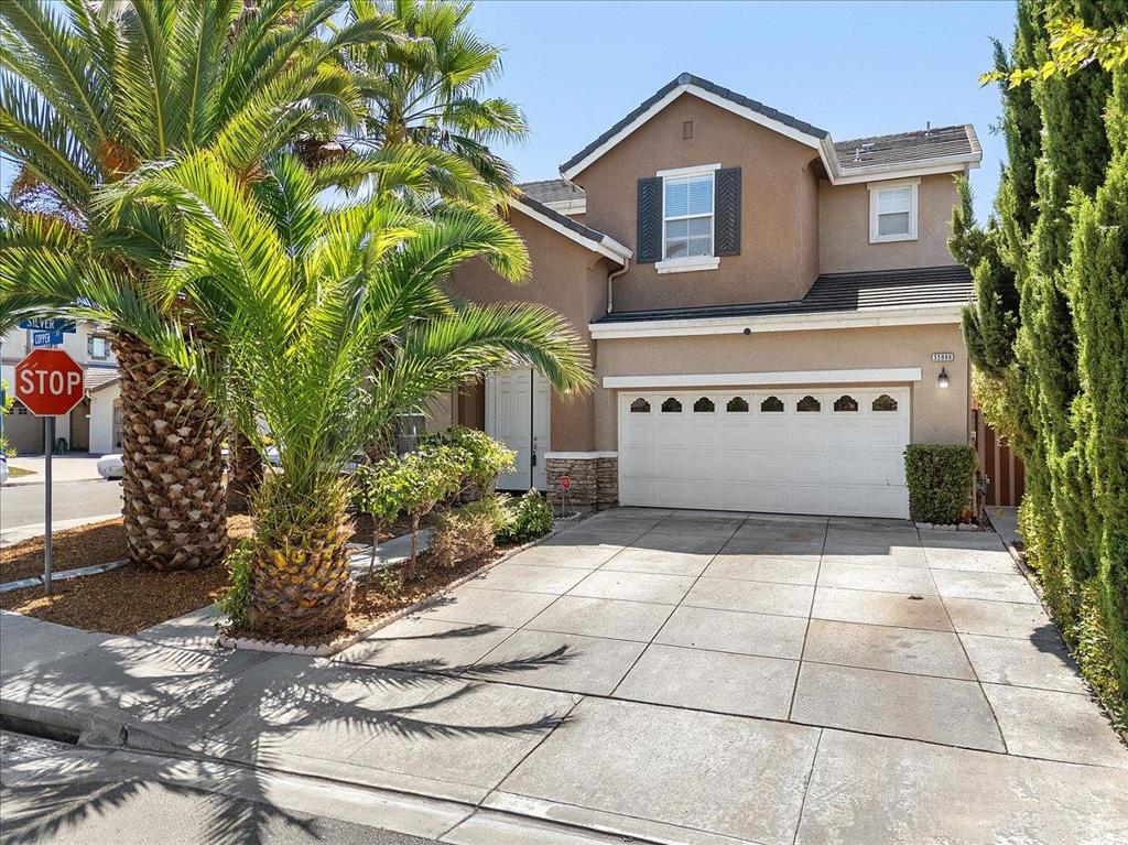 Welcome to this spacious 5-bedroom, 3-bathroom home (full bedroom and full bath on 1st floor) located in the vibrant city of Union City. Featuring a thoughtfully designed kitchen equipped with modern amenities such as a gas cooktop, granite countertops, built-in oven, double oven, microwave, and refrigerator, this home is perfect for culinary enthusiasts. High and vaulted ceilings throughout the home create an airy ambiance, while the cozy fireplace adds warmth to the living space. The home features new flooring and interior paint, energy-efficient double-pane windows, central AC and heating. No HOA. Corner lot home across from community park; conveniently near grocery markets, public parks/lakes w/ hiking trails, Bart Station and highways.