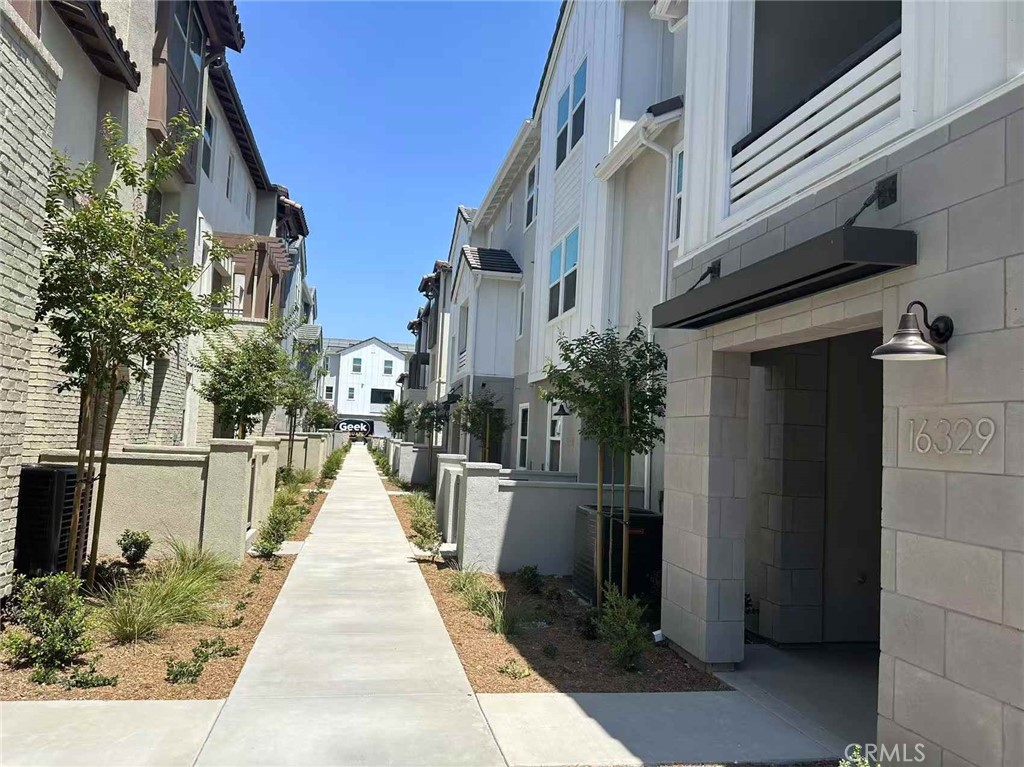 This stunning new construction features 4 spacious bedrooms and 3.5 bathrooms, thoughtfully designed across three levels.
Main Level: Includes a private bedroom and full bathroom — perfect for guests or a home office.
Upper Level: Boasts two oversized secondary bedrooms and a luxurious primary suite complete with a dedicated bathroom and walk-in closet.
Modern Kitchen: Upgraded finishes, ideal for cooking and entertaining.
Additional Features:
Private balcony
Upstairs laundry room
Two-car garage with a 40AMP EV charging port installed
Owner-paid solar system for energy efficiency and savings
Community Amenities:
Enjoy access to a beautifully landscaped neighborhood with three clubhouses, a gym, event space, BBQ areas, tennis courts, and swimming pools.
Prime Location:
Conveniently located near shopping centers and with easy access to the 71 and 91 freeways.