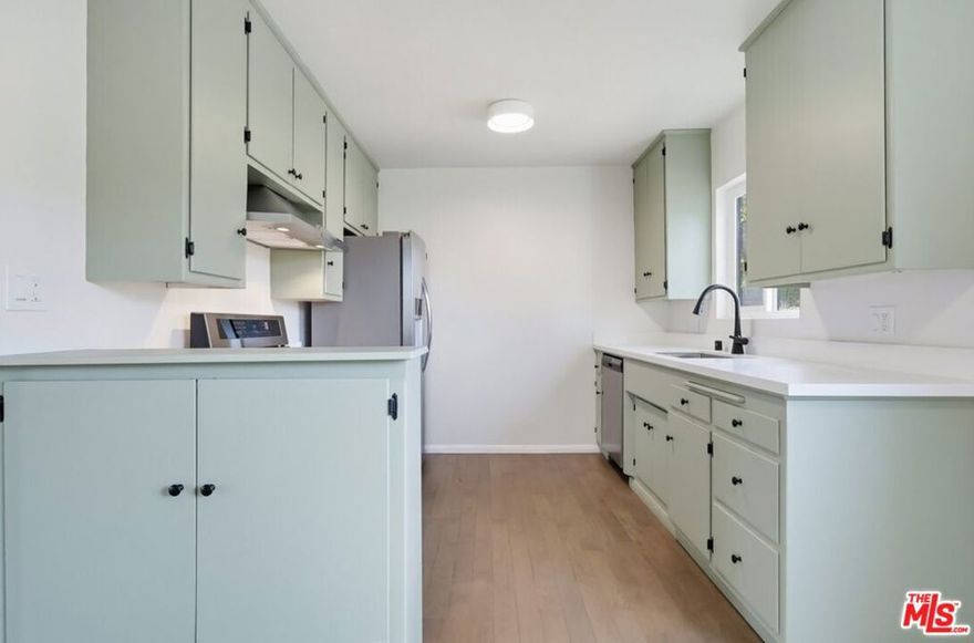 Spacious Mid Century 2 bedroom/2 bath apartment in Mt Washington area! This unit features newly installed oak hardwood floors, a newly refurbished kitchen with all-new appliances including a dishwasher, and tastefully updated bathrooms. New HVAC system and new double paned windows.  The layout offers huge closets and abundant storage throughout. Street parking only. Pets welcome.  Conveniently located near the shops, restaurants, and cafes of Eagle Rock and Glassell Park.