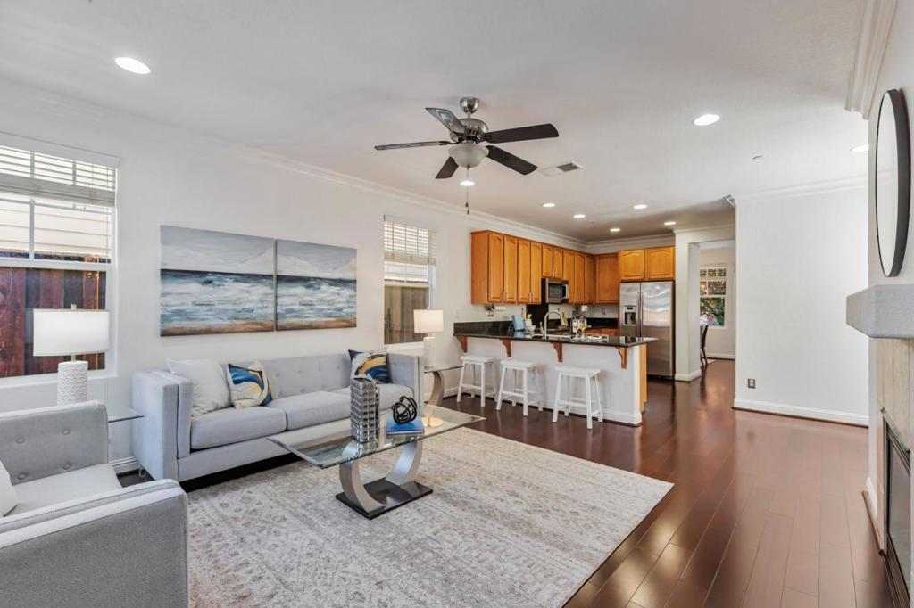 A beautifully maintained and freshly painted home nestled in one of Gilroys most sought-after neighborhoods. This clean and move-in ready property offers a comfortable and inviting atmosphere with a smart layout that suits both everyday living and entertaining. Step inside to discover wood flooring throughout, creating a warm and cohesive feel in every room. The bright kitchen features sleek stainless steel appliances, ideal for both everyday meals and hosting guests. The custom master closet provides ample, well-organized storage, while the included washer and dryer. Additional features include custom garage cabinets for extra storage and organization, along with fresh interior that enhance the homes modern appeal. Outside, enjoy excellent curb appeal, well-kept landscaping, and a peaceful, friendly community. Commuters will love the easy access to major highways, making travel to San Jose, Morgan Hill, or the greater Bay Area a breeze. Whether you're a first-time buyer, a growing family, or simply looking to settle into a welcoming neighborhood with outstanding surroundings, this home is a must-see!