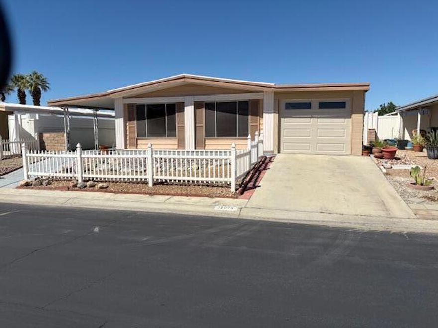 This home has a view of the mountains looking south and sits on a large lot backing up to the Santa Rosa land.  Open floor plan in the kitchen and family room! The kitchen has been completely updated with soft close cabinets, quartz counters, center island with gas oven and stove top and new appliances.  The flooring has been updated thru out the home with laminate planking.  The AC is approximately. 4 years old.   The partially enclosed car port area for parking with a garage door opener.   Large back yard to design with your ideas and there is a large shed for storage!  This a senior community 55+, the HOA dues are $400 / month which includes golf, 3 pools, 24hr security, trash, cable tv and internet. There are many clubs that you can join, Pickle ball, tennis, bocce ball to name a few!  There is pro shop, restaurant, bar and a large banquet room, library and indoor shuffle board.