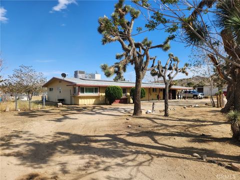 Photo of 7425 Joshua View Drive, Yucca Valley, CA 92284 (MLS # DW26068512)
