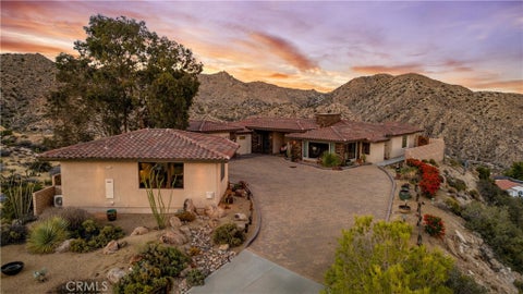 Photo of 53905 Pinon Drive, Yucca Valley, CA 92284 (MLS # JT26223245)