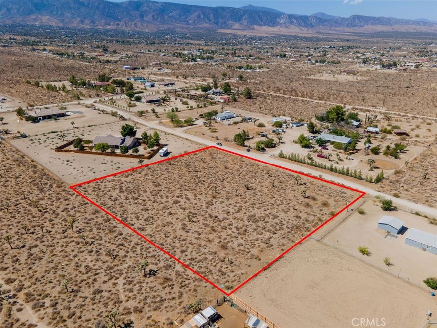 Discover the perfect blend of peace, space, and natural beauty with this spacious 2.3 Acre Lot. The neighborhood is complimented by quality homes nearby, which means utilities should be close! Unobstructed mountain & desert views by day, full starry skies by night. Your very own piece of the High Desert awaits you!