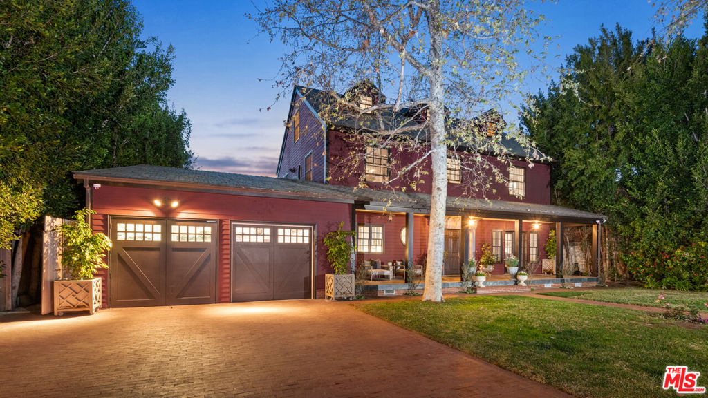 This distinctive home is nestled in the heart of the Santa Monica Canyon while being just steps away from the shore. This custom beauty, designed by Marc Appleton, sits on over 11,000 square feet, exudes charm from every room, and is a true masterpiece. From the hand carved artistry in the dining room by Peter Bolton, to the vegetable garden and guest house, this beautiful home has everything you could need. The main home features 5 bedrooms and 5 bathrooms, four stories, an elevator, wine cellar and a living room which opens up to a covered patio, creating the perfect combination of indoor/outdoor living. The spacious backyard is complete with a lap pool and secluded guest house with its own bedroom and bathroom, providing ample space for visitors to relax. This property allows for a sanctuary within the comfort of your own home. A true gem!