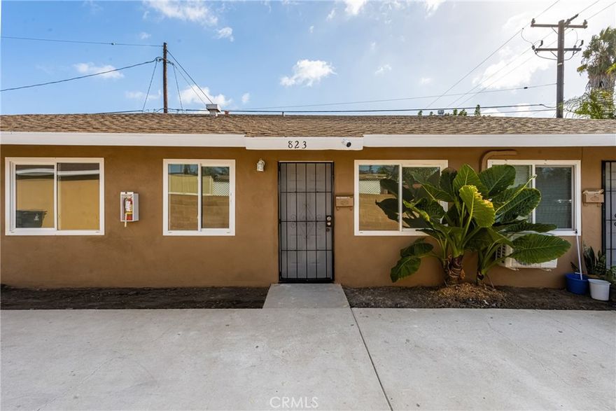 A charming single-level home offering modern updates and a convenient Santa Ana location. This light and bright residence features fresh interior paint, recessed lighting, and new wood-style flooring that enhances the open layout. The remodeled kitchen is complete with granite countertops, white cabinetry, and stainless-steel appliances, flowing seamlessly into the dining and living areas. The spacious bedroom provides ample natural light, while the upgraded bathroom showcases contemporary tile work and fixtures. Outside, enjoy a driveway parking for added comfort and security. Centrally located near shopping, dining, schools, and easy freeway access, this home is move-in ready.