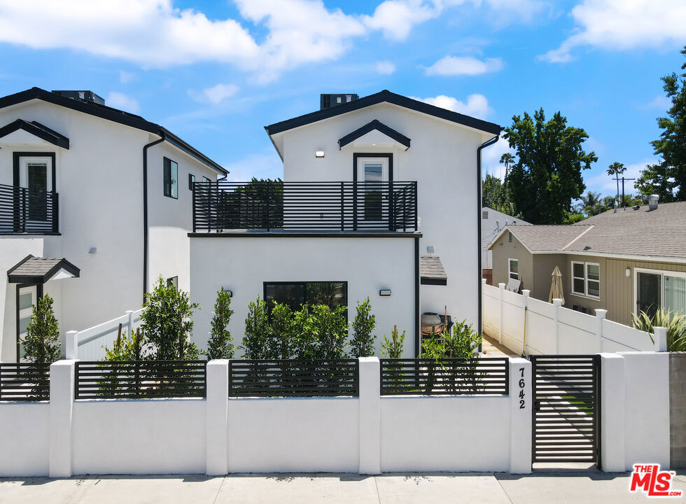Discover this brand new townhome featuring 3 bedrooms and 3 bathrooms, with private front and back yards, and solar. The first level offers a convenient bedroom, while the remaining two bedrooms are located upstairs. The home boasts an open floor plan with high ceilings and an abundance of natural light. The European-style kitchen is equipped with stainless steel appliances, including a refrigerator, range, microwave, washer, and dryer. Enjoy modern living in this beautifully designed space.