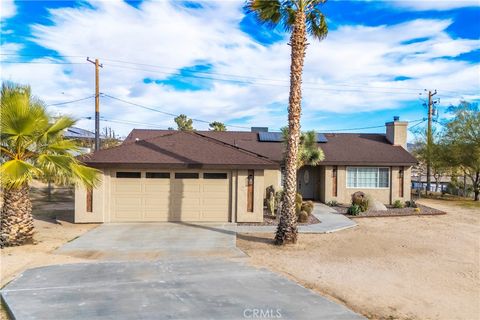 Photo of 6463 Murrieta Avenue, Yucca Valley, CA 92284 (MLS # JT26004865)