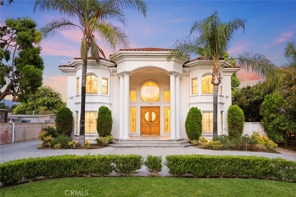 This Gorgeous & Elegant 2 story custom estate located on Beautiful and Quiet neighborhood with distinguished Arcadia School District. It features private security gated, stately 2 column studded entrance leads to a grand foyer under cathedral ceiling featuring a magnificent crystal chandelier. Downstairs of the main house: wood-paneled library; marble-floored living room; large newly remodeled built-in shelf for ample storage spaces . Family room with a newly build wet bar connected to the fully remodeled gourmet kitchen behind dining room and a fully remodeled separate wok kitchen. 2 bedroom suites, plus a 1/2 bath as the powder room for guest. Upstairs: 2 hard wood staircases connected downstairs; 4 bedroom-suites with common area for study or recreation; Jacuzzi tub, steam room, 3 walk-in closets and retreat area inside the master suite against with beautiful view of San Gabriel mountains. Palm trees surround the detached guest house(1500 sqft) with permit for entertainment , Sparkling pool and water fountain. Refinements such as marble, stone, custom-made cabinetry, drapes and built-ins are evident throughout with many stained-glass windows. Front yard features circular driveway and garden with year-round roses and fruit trees. 3-car attached garage plus plenty of car parking space. Walking distance to schools, super-market and multi-cultural eateries. A Great opportunity to own this Luxurious Home !!!