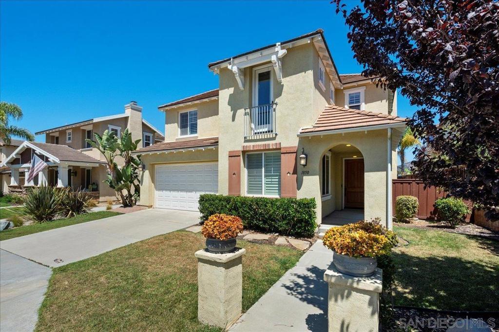 This stunning 5-bedroom, 4.5-bath home, complete with two offices, offers 3,875 square feet of luxurious living space and is ideally located in the highly desirable Mahogany neighborhood of Old Creek Ranch. The property features breathtaking views of San Elijo and the lush surrounding mountains, creating a picturesque setting that is truly one-of-a-kind. The home boasts a fresh, updated interior with new carpet throughout all rooms. The open and airy floor plan includes a formal entryway with a spiral staircase, a relaxing living room, and a charming courtyard area off the dining room. The expansive kitchen overlooks the family room and is equipped with stylish white cabinetry, a large center island, and a butler's pantry. The private master suite is a serene retreat, featuring a spa-like bathroom and a walk-in closet. Additionally, the home includes a convenient entry-level suite, spacious secondary bedrooms, and an upstairs study/play nook. The three-car tandem garage provides ample parking and storage space. Other notable highlights of the home include beautiful wood floors, crown molding, plantation shutters, vaulted ceilings, and air conditioning for year-round comfort. The property offers tranquil mountain views from sunrise to sunset. Situated just a 15-minute drive from the beach and zoned for top-rated schools Carrillo Elementary, San Elijo Middle, and San Marcos High School the location provides both convenience and accessibility. It is also close to parks, trails, and San Elijo Town Square.