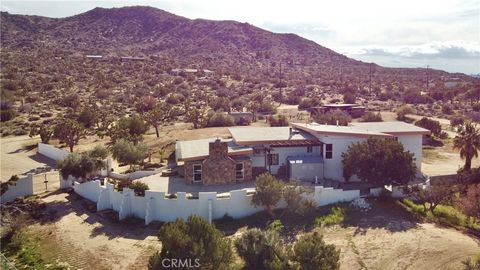Photo of 55149 Hoopa Trl, Yucca Valley, CA 92284 (MLS # JT26100864)