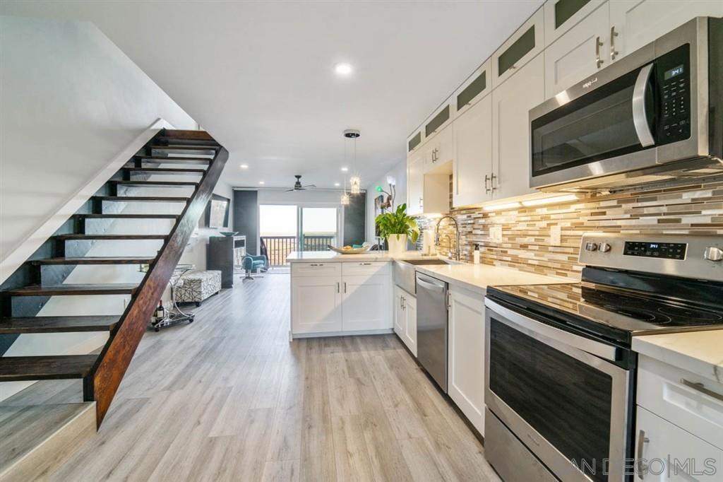 Stunning Imperial Beach Get-a-way. Enjoy this 2 BD 1.5 BA newly remodeled beach condo with designer touches throughout. Unobstructed views of the estuary with a peak of the ocean from the master bedroom. Located across the street from the beach, walking distance to restaurants, shops, the Pier & more. Community pool & laundry facility on site. Come & relax with the beach a few steps away in this beautiful get-a-way! Prices vary with length of stay & time of year. Off Season prices starting at $2800 to Summer prices $5500 per month.
