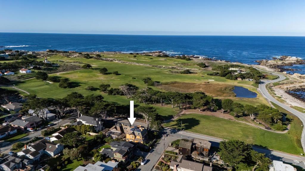This English Tudor-style home, built in 2001, offers an exceptional blend of views, location and architecture. Situated on a prime corner lot, its thoughtful design maximizes breathtaking ocean and golf course views from the main living area. Two spacious guest bedrooms on the main level offer the flexibility to be converted into a ground-floor primary suite that opens to the backyard. The primary suite upstairs boasts stunning ocean views, an attached office, and a spacious balcony perfect for enjoying the scenery. A private guest unit sits above the two-car garage, providing an ideal space for visitors or rental potential. Beyond the home, the lifestyle is unbeatable. Enjoy lunch at Point Pinos Grill, tee off at Pacific Grove Golf Links, or take a leisurely walk along the waterall within walking distance. This is coastal living at its finest!