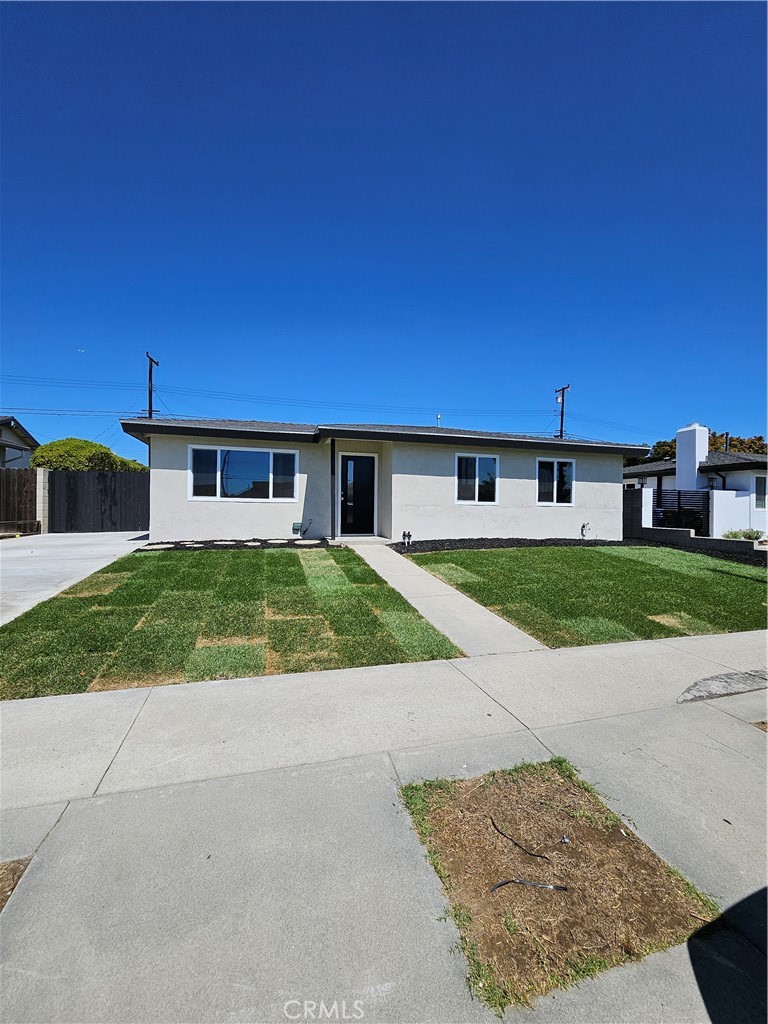 Absolutely Gorgeous Fully Remodeled 3 Bed / 2 Bath Home – Chef’s Kitchen, Designer Baths, Private Yard & More!
This stunning fully remodeled 3-bedroom, 2-bathroom home is the perfect blend of modern luxury, thoughtful design, and everyday comfort. From the moment you walk in, you’ll be impressed by the open layout, gorgeous wide plank flooring throughout, and high-end finishes in every room.
Step into a spacious family room that flows seamlessly into a huge chef’s kitchen featuring:
Sleek quartz countertops
Oversized stainless steel farmhouse sink
Built-in wall oven and microwave
Modern cooktop
All brand-new cabinetry with soft-close doors, a spice rack, large pantry, and stylish wine rack
Each of the three bedrooms is generously sized, offering comfort and space. The primary suite is a true retreat with a gorgeous en-suite bathroom that boasts:
An oversized walk-in shower with stunning custom stonework
Dual vessel sinks atop elegant new cabinetry
Modern finishes and luxury touches throughout
The shared hall bath is equally impressive, featuring:
A stone walk-in shower
Designer vessel sink and all-new cabinetry
Step outside and enjoy a private backyard oasis—perfect for entertaining, relaxing, or family gatherings. The yard includes a grassy area, plenty of room for seating, and a 2-car detached garage with private gated parking.
Additional Features Include:
Brand new dual-pane windows to keep the home cool and quiet
Central A/C and heat – a rare and valuable feature
Conveniently located near schools, shopping, and major freeways
? This home has it all—style, space, function, and charm. Truly move-in ready and absolutely gorgeous. Don’t wait—this one won’t last!
?? Schedule your private showing today!