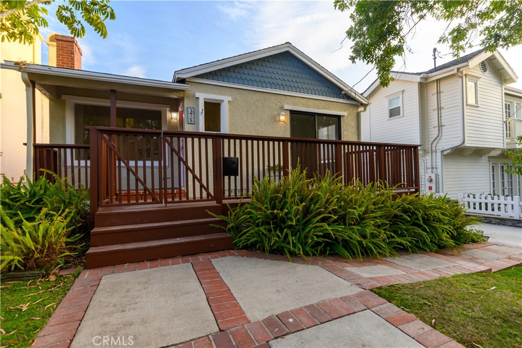 This charming 3 bedroom, 2 bath single-family home with a detached garage is located in the highly desirable Tree Section of Manhattan Beach. The home features a bright and spacious living room with hardwood floors, a cozy fireplace, and a large picture window that fills the space with natural light. A separate dining area with built-in cabinetry opens through sliding doors to a front deck overlooking the tree-lined street, while the kitchen offers ample cabinet space and connects to a dedicated laundry room with washer and dryer included. The bedrooms are generously sized with good closet space, ceiling fans, and natural light, complemented by two full bathrooms with original tiled finishes that add character.
Outdoors, enjoy a private grassy backyard perfect for entertaining, relaxing, or play. A long driveway and detached two-car garage provide ample parking and storage. Situated on a peaceful street, this home offers the perfect blend of charm and convenience, just minutes from downtown Manhattan Beach, award-winning schools, boutique shopping, dining, and the beach.