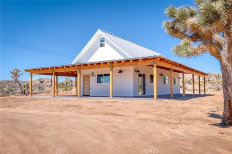 Photo of 56215 Paseo Los Ninos Dr, Yucca Valley, CA 92284 (MLS # JT25175748)