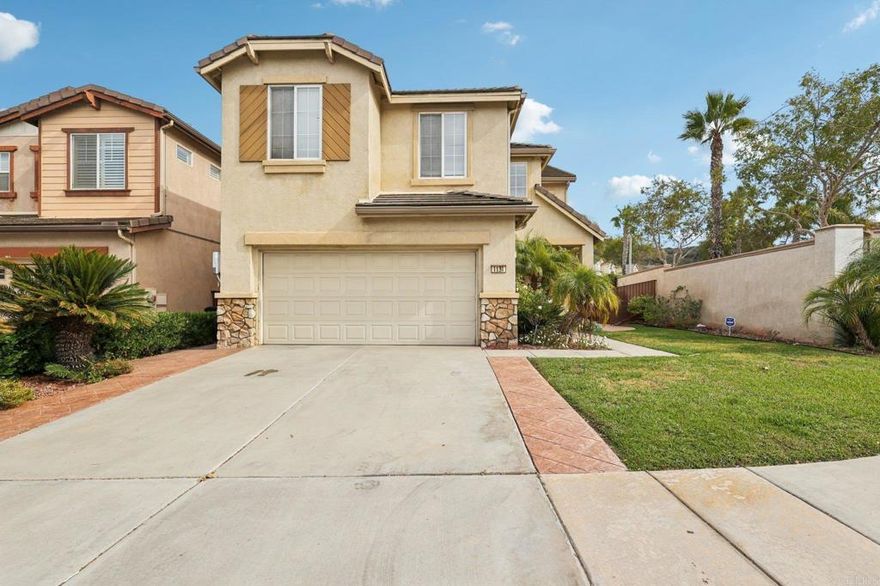 First time on the market since new! Wonderful 5 bedroom home on a corner lot in Ocean View Hills. Paid off solar panels! Highly sought after bedroom and full bathroom downstairs. Large open concept kitchen with center island and granite countertops, adjacent to the family room with fireplace, perfect for entertaining. All appliances including washer and dryer stay. Travertine flooring. Elegant floor plan with dramatic high ceilings in the living and dining room. The spacious primary bedroom is tucked away from the other bedrooms, separated by its own hallway that overlooks the lower level, offering both privacy and architectural charm.  Also features a large walk in closet and bathroom with dual sinks and separate tub & shower. Lots of curb appeal with decorative stone accent details. Lush landscaping with stunning stamped concrete throughout. AC unit with central air. Plenty of space for the entire family. Charming Westport Cove community which is close to shopping, restaurants, parks, and freeways. This is a must see home.