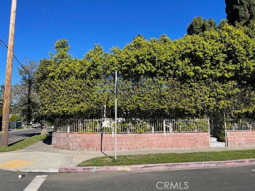 Welcome to this gated private corner lot home located on a nice residential neighborhood of North Hollywood.  With 4 bedrooms & 2 baths, this charming home has wood floors and a fireplace in the living room, a lovely dining area that gets plenty of light, a galley kitchen with a double sink, granite counters, tile floors and numerous cabinetry and storage.  You will find 2 of the bedrooms and a bathroom as you enter the front door and the other 2 bedrooms are off the laundry area/kitchen. It is worth noting that the ensuite bedroom off the laundry is very large with a walk-in closet and has an auxiliary room that can be used as an office or another living space.  The front yard is quite lovely with trees, plants & grassy areas throughout while the backyard has a carport and a large patio area for your table and chairs as you entertain outdoors or have your morning coffee. Modern comforts such as central air & heat and solar panels complete this home.  Conveniently located near Noho West, Burbank airport, freeway access and to numerous shops and restaurants.