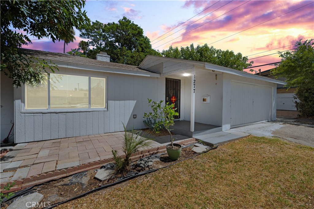 Highly Motivated Seller! Room for Two Families! Welcome to this beautifully updated home in North Pomona, offering space, versatility, and comfort for multi-generational living or potential rental income. Featuring a total of 5 bedrooms and 3 bathrooms, the property includes a spacious main house with 4 bedrooms and 2 baths, plus a separate 1-bedroom, 1-bath guest unit with its own kitchen—making it ideal for two families or flexible living arrangements. This home was fully remodeled just two years ago and shows pride of ownership throughout. The upgrades include exterior paint, dual-pane windows, central air conditioning and heating, and an irrigation system for the front yard. Inside, you’ll find wood laminate flooring, recessed lighting, and remodeled kitchens with granite countertops, modern backsplash, and stainless steel appliances, including a stove, microwave, and dishwasher. The bathrooms have been tastefully redone with custom tile showers, updated vanities, and stylish tile flooring. Additional improvements include updated electrical and plumbing fixtures, as well as new doors and moldings throughout the home. Located in a culturally vibrant neighborhood, Pomona is known for its rich diversity, food, art, and community events. 1277 Mindo Dr is conveniently close to shopping, dining, and several public parks. Washington Park, just minutes away, offers a community pool, playground, and facilities for basketball, tennis, and soccer. FHA, VA, and Conventional financing are all welcome. Don’t miss this unique opportunity—homes with this kind of setup and recent renovations are rare and don’t last long! All information is deemed reliable but not guaranteed. Buyer and buyer’s agent to verify all aspects of the property, including but not limited to square footage, bedroom and bathroom count, and permits.