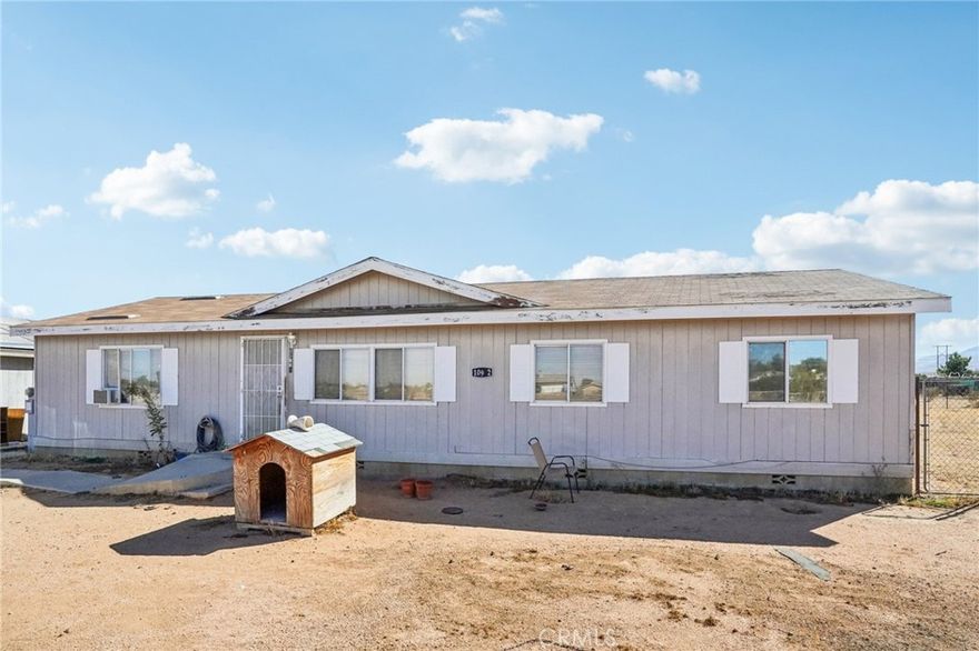 Spacious living meets endless potential in this 4 bedroom, 2 bathroom home set on nearly an acre in Apple Valley. Situated on an over 40,000 sq ft lot, this property offers plenty of room to spread out and enjoy, with the added benefit of horse property potential for equestrian enthusiasts. A detached 2-car garage provides convenience and extra storage, while the expansive lot offers opportunities for RV parking, outbuildings, or creating your own outdoor retreat. Inside, the home features a practical and comfortable layout with four well-sized bedrooms and two full bathrooms, making it ideal for families or those seeking extra space. Perfectly located close to markets, schools, and with easy access to the 18 freeway, this property combines space, convenience, and opportunity. A versatile property with endless possibilities!