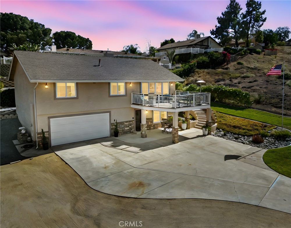 The Home You’ve Been Waiting For is FINALLY Here – and It Won’t Last Long! Welcome to your dream home retreat! This stunning property has been meticulously renovated and lovingly maintained for over 20 years. Designed with both comfort and functionality in mind, it features a spacious open-concept layout, vaulted ceilings, and seamless indoor-outdoor living — truly an entertainer’s dream! Natural light pours in through oversized windows, and your private balcony with panoramic views offers the perfect spot for morning coffee. Surrounded by nature and the peaceful sounds of birdsong, this home offers tranquility and relaxation at every turn. At the heart of the home is a brand-new designer kitchen valued at over $60,000, complete with Café appliances (included!) and stunning finishes. Every inch has been thoughtfully upgraded, including: beautifully remodeled bathrooms, wood-grain luxury vinyl plank flooring, new baseboards and fresh interior paint, new windows and custom premium exterior doors, Shaker-style interior doors with updated hardware, recessed lighting, stylish fixtures, updated switches and outlets, upgraded fireplace, A/C and ducting, updated water heater, upgraded sump system, SimpliSafe Home Security system and raised ceilings throughout. Outside, enjoy ample parking for boats, cars, trucks, trailers, and RVs — complete with RV hookups — plus an extra-deep garage (20' x 32') perfect for a workshop or storing all your toys. The low-maintenance landscaping means more time to relax and enjoy the million-dollar views. Tucked away in a quiet, serene location yet just minutes from shopping, dining, groceries, and entertainment — with quick access to the 91 and 215 freeways — you’ll enjoy the best of both worlds: peaceful rural living with modern-day convenience. With premium upgrades, high-end finishes, low property tax rate and breathtaking views, this home is a rare opportunity you don’t want to miss. The pictures don’t do it justice — you have to see it in person to truly experience the quality, craftsmanship, and feeling this home provides. Don’t wait — this is the one you’ve been dreaming of!
