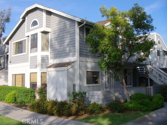 Great upper unit with views of trees and pool beyond! Sunny, light and bright with high ceilings. Features 2 bedrooms and 2 baths and inside laundry with a stacked washer and dryer.Beautiful remodeled kitchen with stone counters and updated cabinets. Good size dining room with bay window. Laminate flooring, ceiling fans and built-ins in the living room and master bedroom. Plantation shutters. Carpet in bedrooms, Nice patio for relaxing. Extra storage closet outside. Detached 1 car garage. Beautiful remodeled pool area. There is a great park at entry to tract for sports and picnics. Close to shopping, schools and freeways.