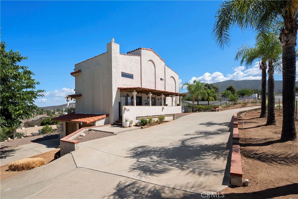 Welcome to this stunning home, situated on an acre of land featuring vaulted ceilings that create an open and airy atmosphere throughout. The spacious open floor plan seamlessly blends living, dining, and kitchen areas, making it perfect for both everyday living and entertaining. The home features natural light throughout thanks to the expansive windows that offer breathtaking, unobstructed views of the surrounding mountains.
The modern kitchen is a chef's dream, complete with sleek stainless steel appliances, including a dual oven for cooking flexibility. The energy-efficient solar panels not only reduce your environmental footprint but also lower utility costs.
Whether you're enjoying a cozy evening in the living room or preparing a meal in the kitchen, you always be surrounded by the beauty of nature with panoramic mountain views as your backdrop.