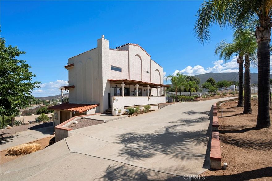 Welcome to this stunning home, situated on an acre of land featuring vaulted ceilings that create an open and airy atmosphere throughout. The spacious open floor plan seamlessly blends living, dining, and kitchen areas, making it perfect for both everyday living and entertaining. The home features natural light throughout thanks to the expansive windows that offer breathtaking, unobstructed views of the surrounding mountains.
The modern kitchen is a chef's dream, complete with sleek stainless steel appliances, including a dual oven for cooking flexibility. The energy-efficient solar panels not only reduce your environmental footprint but also lower utility costs. 
Whether you're enjoying a cozy evening in the living room or preparing a meal in the kitchen, you always be surrounded by the beauty of nature with panoramic mountain views as your backdrop.